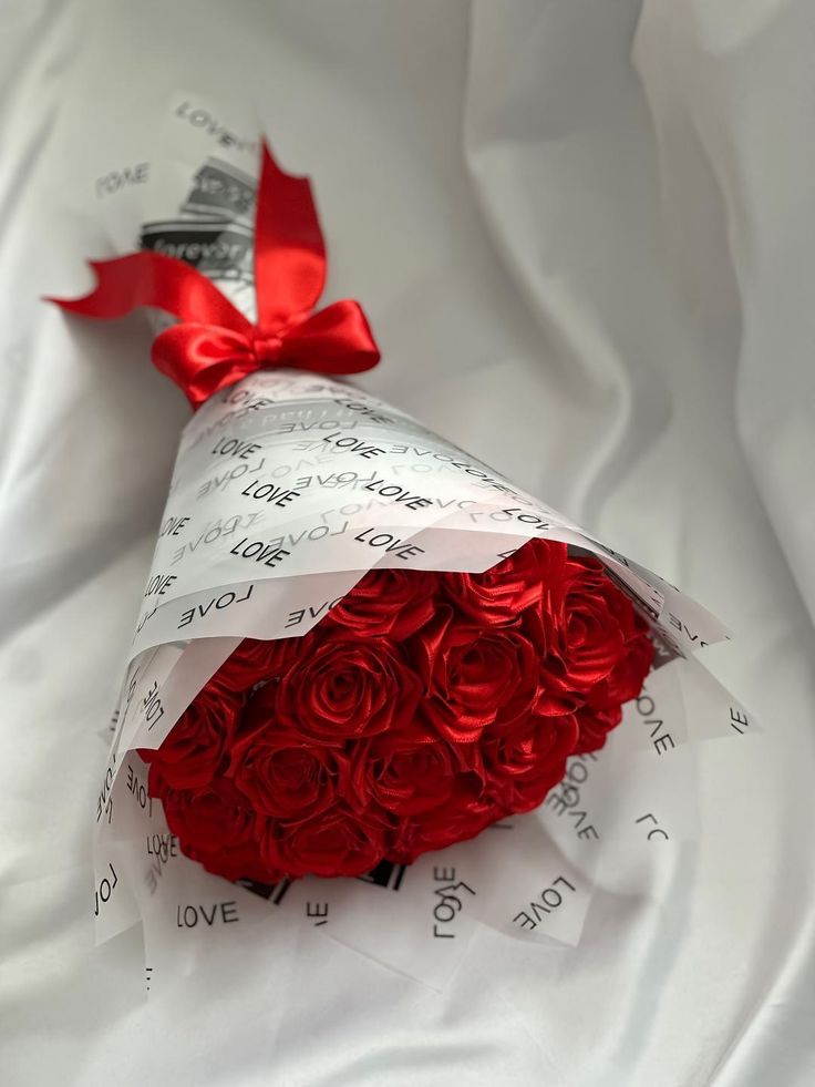 Luxury Red Rose Bouquet with premium white wrapping and elegant ribbon – perfect gift for weddings, anniversaries, or Valentine’s Day."