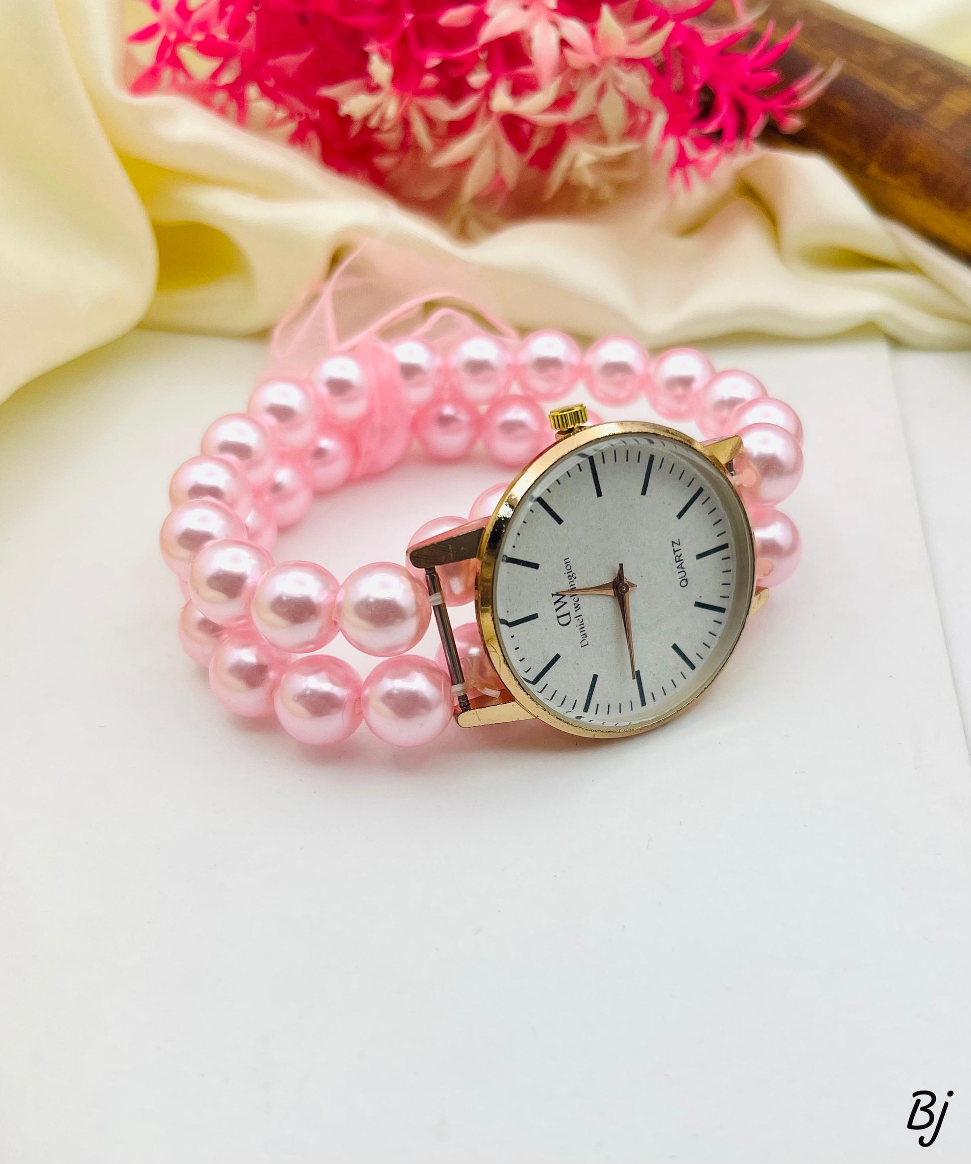 Elegant pink pearl ladies wristwatch stylish and classy design”