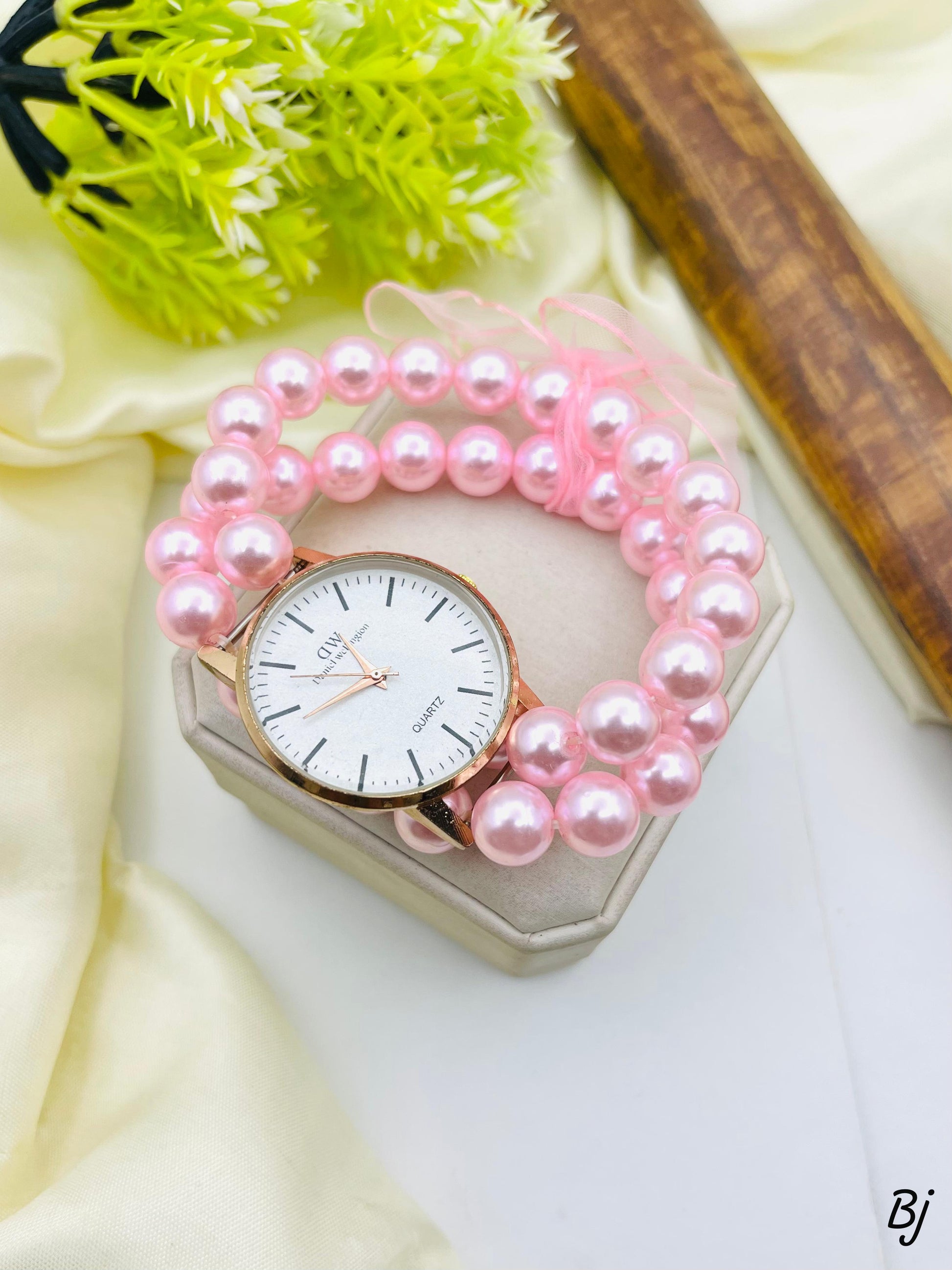 Elegant pink pearl ladies wristwatch stylish and classy design”